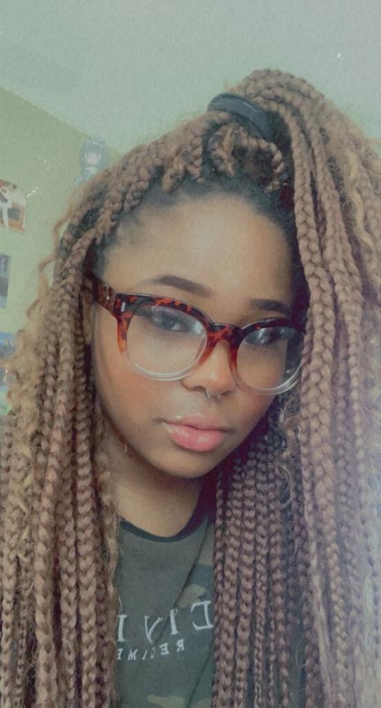 Blonde box braids half-up with glasses