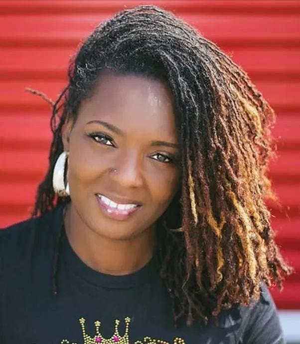 Short curly locs in peach top